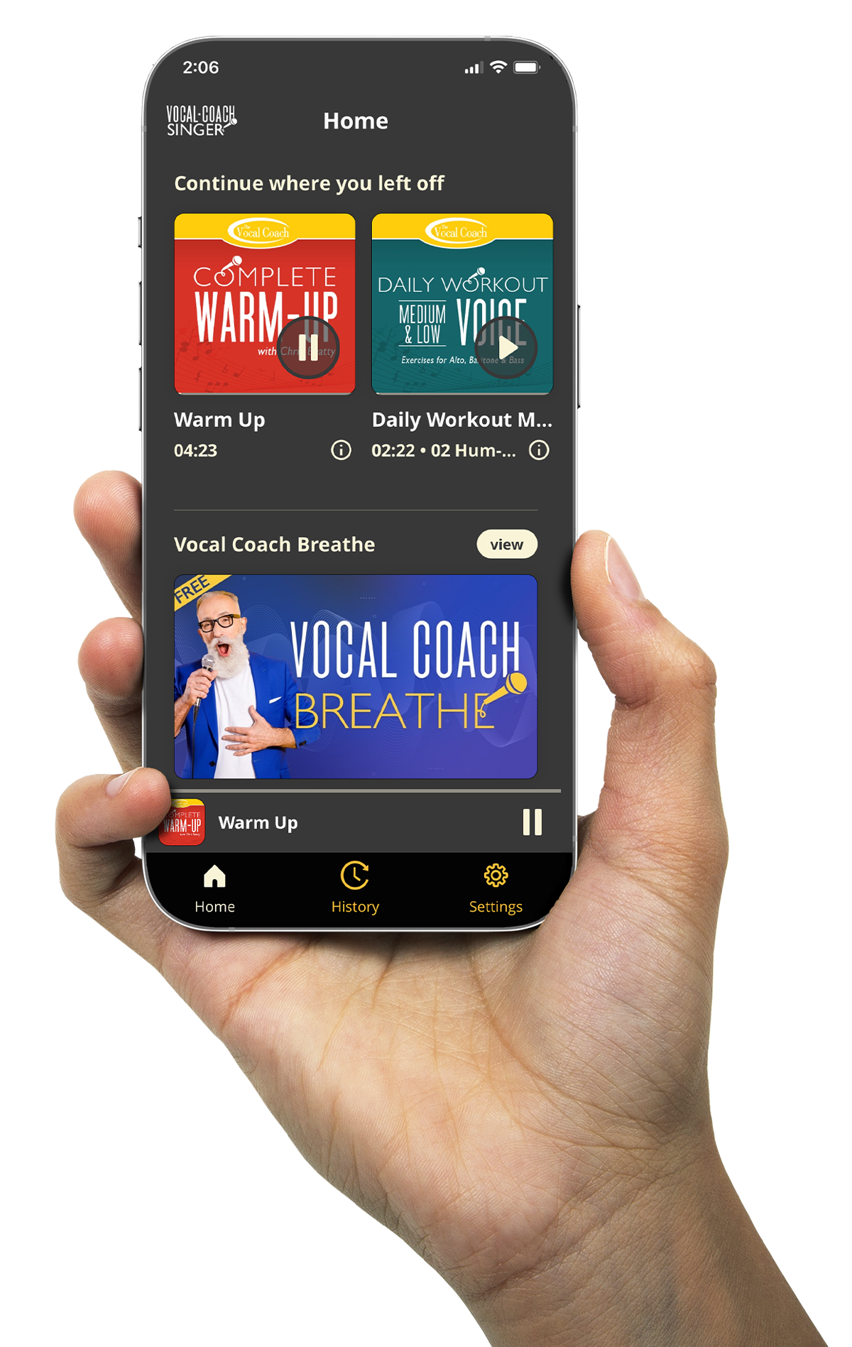 hand holding iphone with vocal coach app homescreen